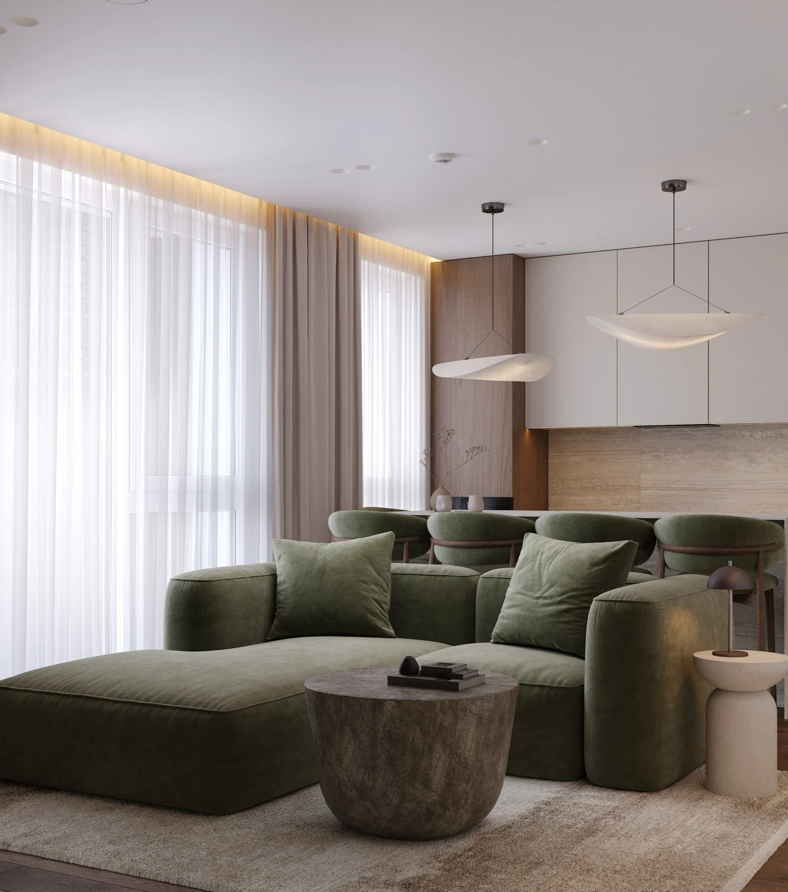 Svetainė su žalia kampine sofa, akmens kavos staliuku ir kabančiais šviestuvais